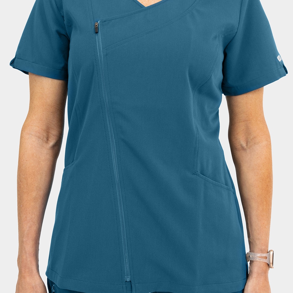 Elite-by-IRG_3801-WomensDressyAsymmetricalZipperTop-CarribeanBlue-CRB-02-IRG-Scrubs-.jpg