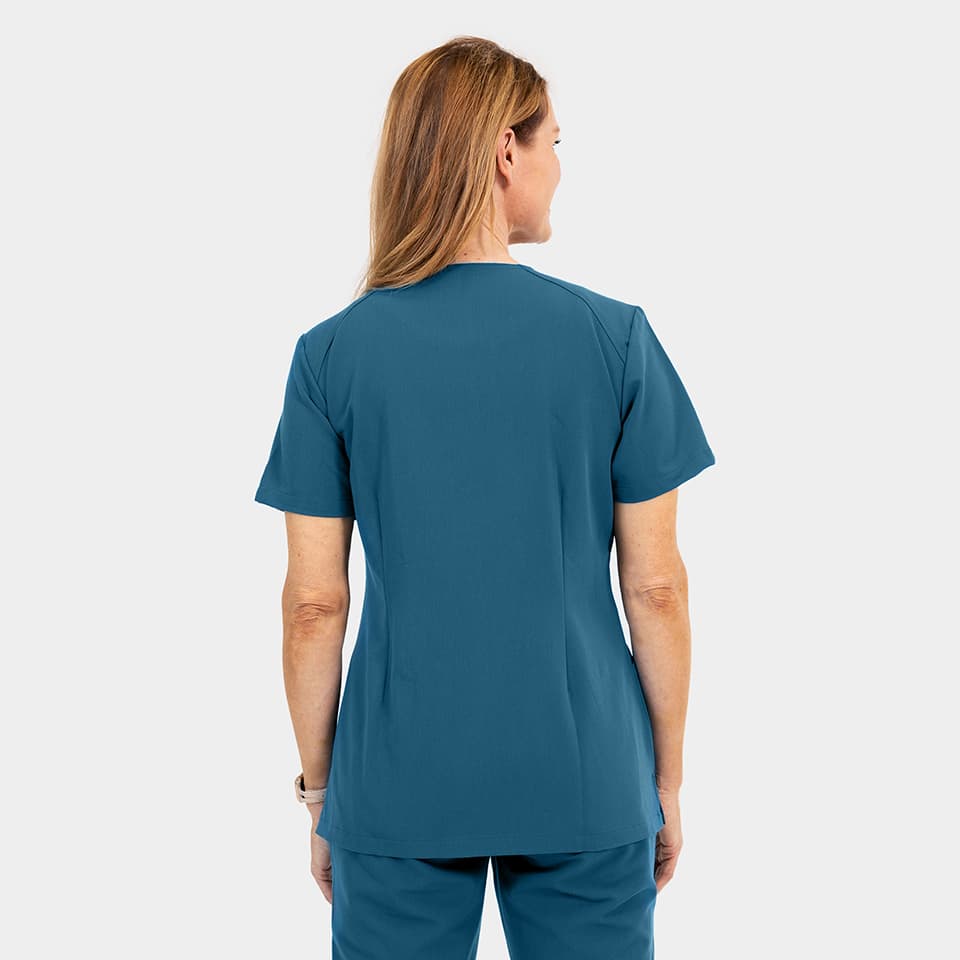 Elite-by-IRG_3801-WomensDressyAsymmetricalZipperTop-CarribeanBlue-CRB-04-IRG-Scrubs-.jpg
